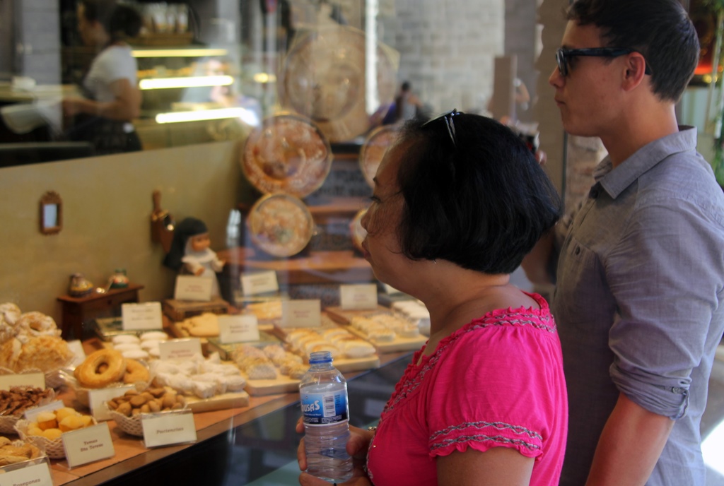 Nella and Philip Gazing at Pastries