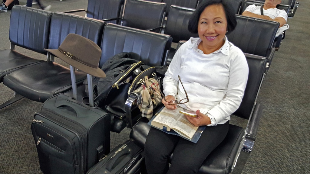 Nella with Carry-On Luggage