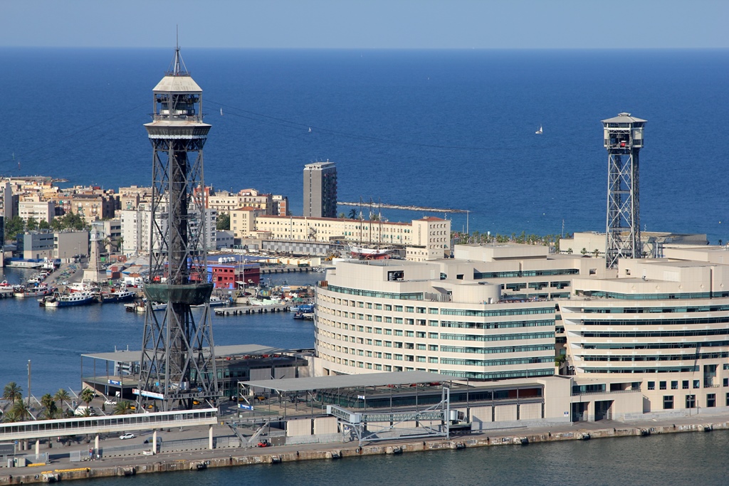 Jaume I and Sant Sebastià Towers with World Trade Center